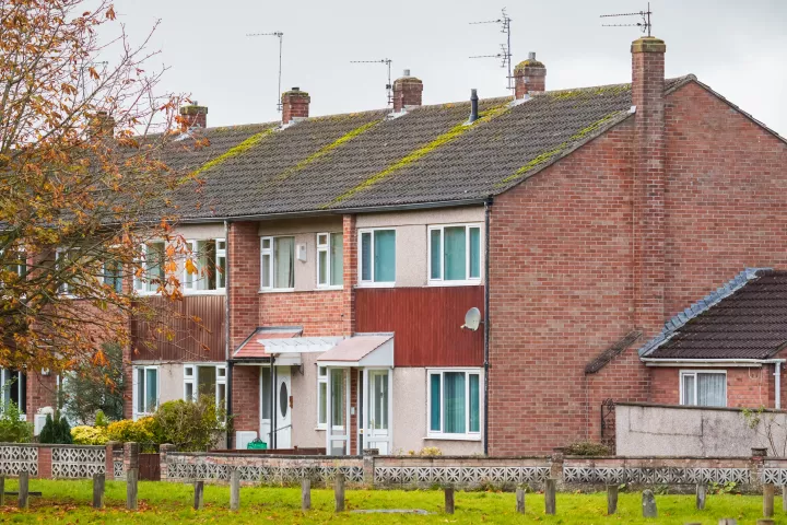 The image shows terraced houses