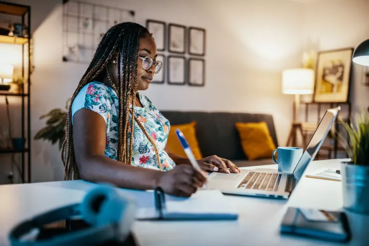 Woman viewing laptop