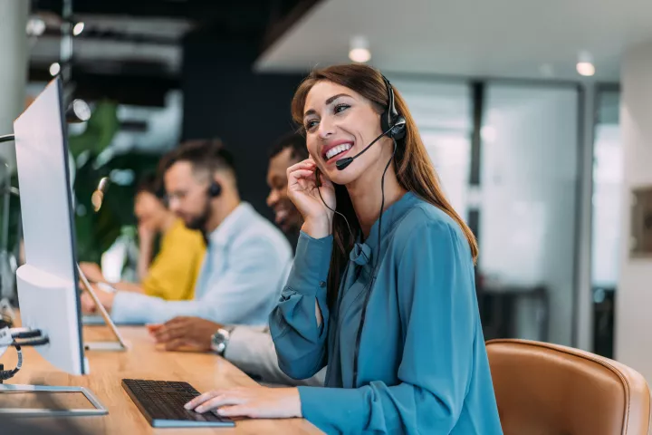 Call centre staff on phone